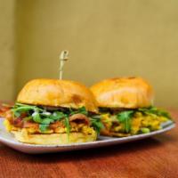 Breky Sandwich  · 2 eggs, double smoked bacon, cheddar cheese, arugula & lemon aioli  on brioche served with P...