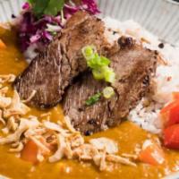 Beef Angus Brisket Curry · Vegan based Japanese curry, served w/potatoes, chickpeas, Ebraised beef shortrib, slaw, frie...