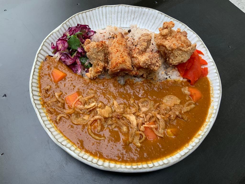 Fried Chicken Curry · Vegan based Japanese curry, served w/potatoes, chickpeas, fried chicken nuggets, slaw, fried shallots, pickles