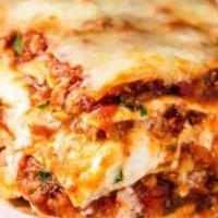 Lasagna · Thick layers of fresh pasta, meat sauce, ricotta, and mozzarella.