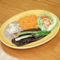 Carne Asada · Butter fried steak served with 2 greeen onions.