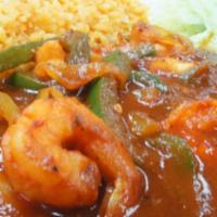 Camorones Rancheros · Shrimp, bell peppers, tomatoes and onions sauteed in our spicy ranchero sauce. Mixed with be...