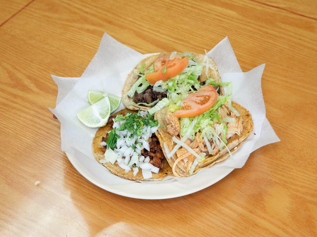 Al Pastor Taco · Seasoned pork. Served with a side of rice and beans.