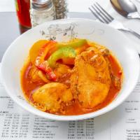 Pollo Guisado · Chicken stew.
