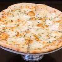White Pizza · Ricotta cheese, mozzarella, grated Parmesan, garlic and no pizza sauce.