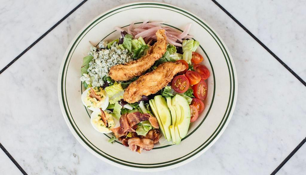 Ted's Cobb Salad · Fried chicken, applewood bacon, tomato, deviled eggs, pickled onions, avocado, Gorgonzola cheese and bacon vidalia ranch dressing.
