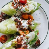 Bleu Cheese Wedge Salad · bacon lardons, cherry tomatoes, iceberg, chives, blue cheese dressing