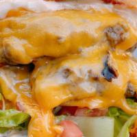 All American Burger · american cheese, shredded lettuce, tomato, thousand island dressing, served with hand-cut fr...