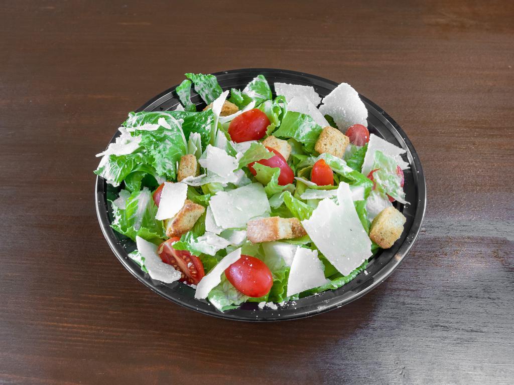 REG Chopped Caesar Salad · Organic Kale , Romaine, Cherry tomatoes, Herb croutons, Shaved parmesan, Caesar dressing