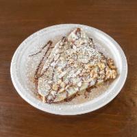 Nutty Nutella Crepe · Nutella, Toasted almonds, Walnuts.