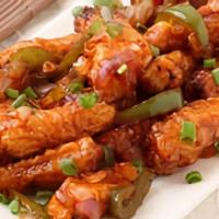 Chilli Baby Corn · Baby corn cooked with green chilies in indo-Chinese sauce.