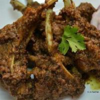 Maa Special Lamb Chops · Lamb chops cooked with spices and sauce.