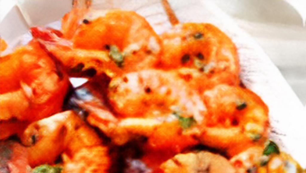 Tandoori Shrimp · Jumbo shrimp marinated in special spices and herbs and grilled in our tandoori oven.