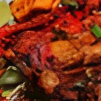Mixed Tandoori Platter · Tandoori chicken, chicken tikka, shish kebab, and tandoori shrimp.
