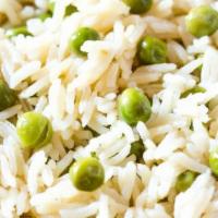 Peas Pulav · Basmati rice cooked with green peas, mint, and butter.