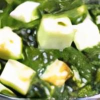 Saag (Palak) Paneer · Tender chunks of cottage cheese cooked in spinach sauce.