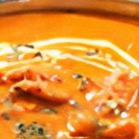 Butter Chicken Masala (Makhani Chicken) · Boneless chicken pieces roasted in a clay oven and cooked in mild creamy tomato gravy.