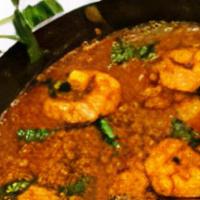 Shrimp Masala · Shrimp sauteed with ginger, garlic, onion, and tomatoes in a semi-dry gravy.