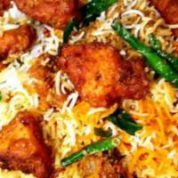 Chicken 65 Biryani · Basmati rice cooked with chicken 65 pieces of spices.