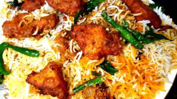 Chicken 65 Biryani · Basmati rice cooked with chicken 65 pieces of spices.