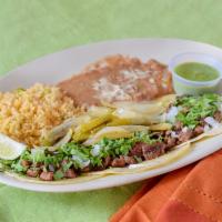 Asada Street Tacos · Choose 5 tacos or 4 tacos with rice and beans.