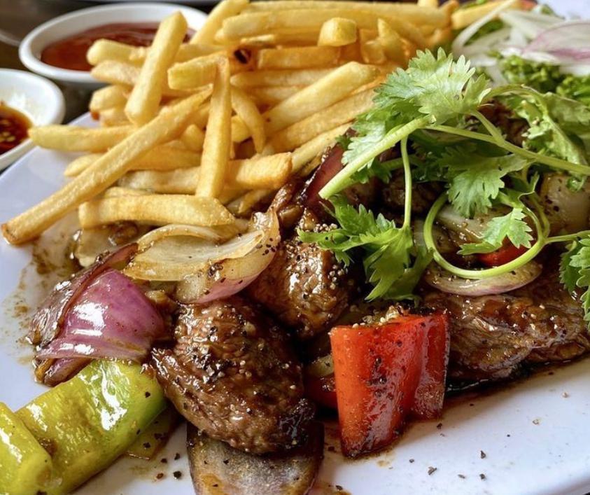 Bo Luc Lac French Fries (Filet mignon) · Shaking filet mignon beef cubes with fries.