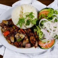 Com Bo Luc Lac (Filet mignon) · Shaking beef (filet mignon) with rice.