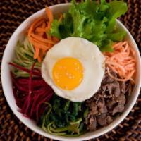 K1. Beef Bibimbab · Rice with vegetables, beef, fried egg and pepper paste. Spicy.