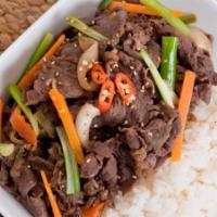 K7. Bulgogi · Marinated slice beef and vegetables served with white rice.