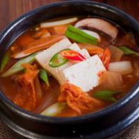 K10. Kimchi Stew · Spicy stew made with ripened kimchi, pork and tofu.