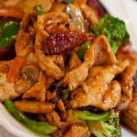 Hunan Meat · Broccoli, cabbage, zucchini, mushroom, green pepper, and snow peas stir fried in a spicy Hun...