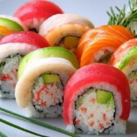 Rainbow Roll · California roll inside with different fish on the top.