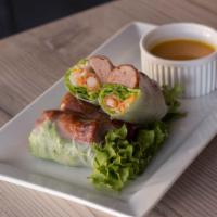 2. Nem Nuong Cha Ram · 2 pieces. Grilled pork paste crispy roll wrapped in rice paper, lettuce, cucumber, carrot, d...