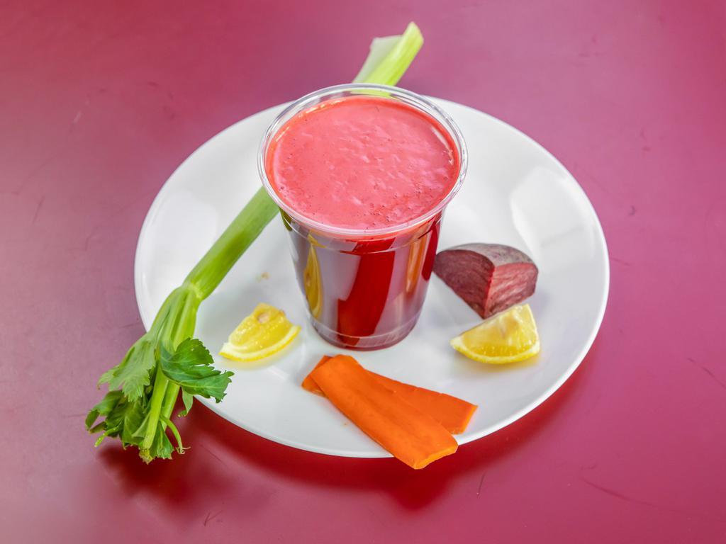 Beet Me Up Juice · Refreshing juice made with beets, carrots, apple, orange, celery, and ginger root. Vegan and gluten-free.