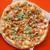 ZBQ Pizza · BBQ sauce, mozzarella, BBQ chicken breast, peppers, red onions, tomatoes, fresh cilantro.