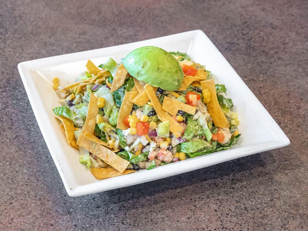 Santa Fe Chicken Salad · Green leaf lettuce, corn, black beans, diced tomatoes, red onions, avocado, tortilla strips, grilled chicken and mozzarella cheese tossed in a cilantro lime dressing.