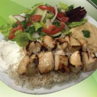 Chicken Kebobs Plate · Grilled to perfection. Includes salad, hummus, garlic paste, potatoes, pickles, turnip, pita...