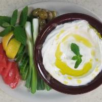 Labne & Zaytoon · Strained yogurt with a generous portion of olives, and complimentary vegetables, to make a d...