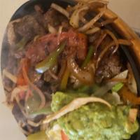 Beef Fajitas Plate · Marinated tenderloin strips of beef sauteed with onions, bell peppers, tomatoes, mushrooms a...
