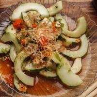 Cucumber Salad · Thinly chopped cucumber with bonito flakes. Topped with ponzu sauce.