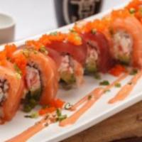 Fuji II Roll · Spicy tuna, snow crab, avocado, asparagus and tuna topped with salmon, smelt roe, eel sauce ...