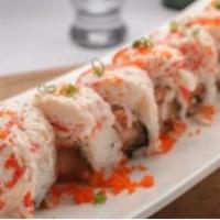 Pepper Girl Roll · Pepper tuna, avocado and smelt roe topped with scallion, snow crab, spicy mayo and chili pow...