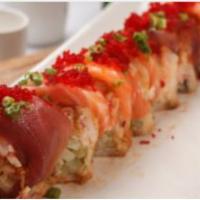 N.O. Championship Roll · Tempura, shrimp, snow crab and tuna, topped with seared salmon, seared tuna, red tobiko, sca...