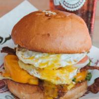 The Hangover · Cheddar cheese, smokehouse bacon, and a fried egg.