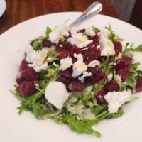 Barbabietole Salad · Roasted red beets with baby spinach and goat cheese.