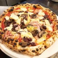 Capricciosa Pizza · Tomato sauce, artichokes, mushrooms, prosciutto cotto, olives, fior di latte and basil.