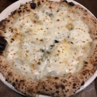 4 Formaggi Pizza · Fior di latte, stracchino, cacio cavallo, Gorgonzola, shaved Parmigiano and basil.