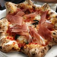 Star Pizza · Ricotta crust Margherita topped with prosciutto di Parma, shaved Parmigiano, arugula and bal...