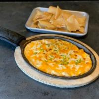 Buffalo Chicken Dip · All of the flavor of our award-winning Buffalo wings jammed into a house-made creamy, zesty ...