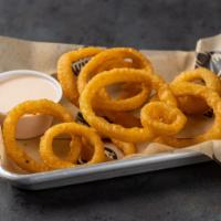 Onion Rings · Crispy breaded onion rings. Served with ECW+G Signature Lava Ranch®. 